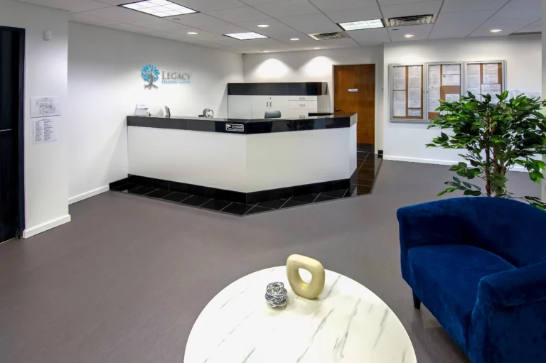 Reception area with seating area and desk at Legacy Healing Center’s Parsippany drug and alcohol rehab